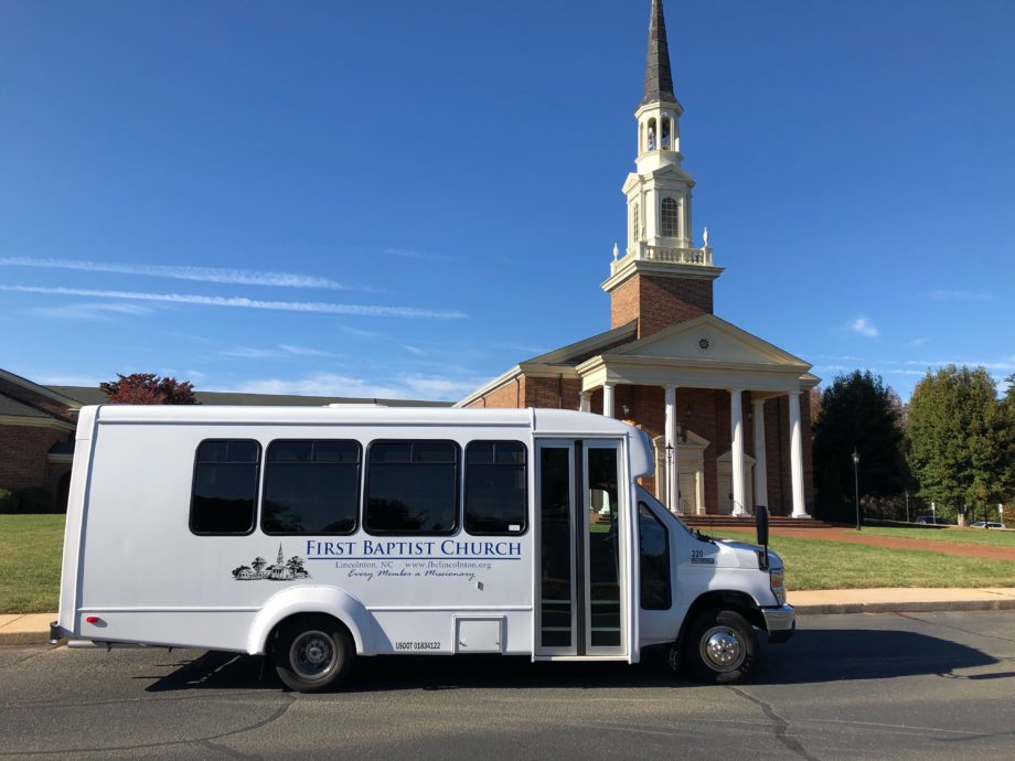 Church Bus in front of church building
